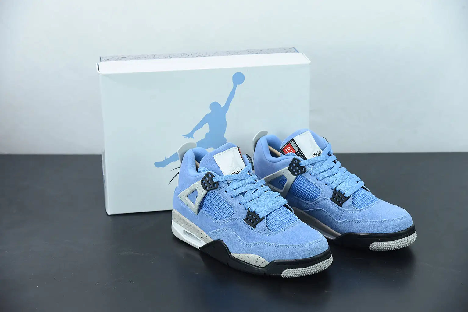 AJ 4 "University Blue"